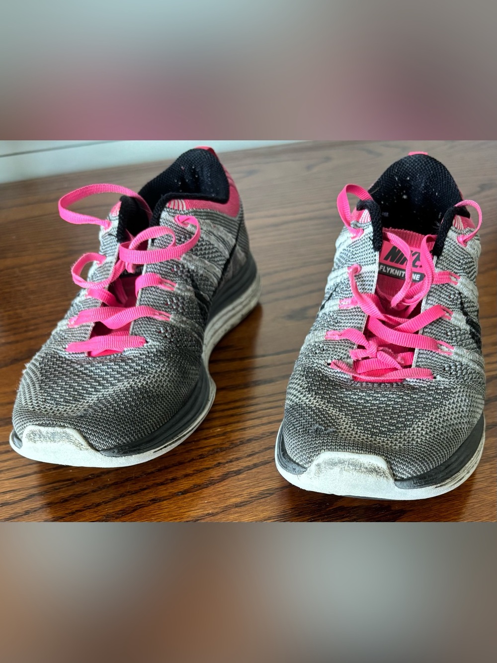 Nike Women’s Gray and Pink Fly Knit Running Sneakers